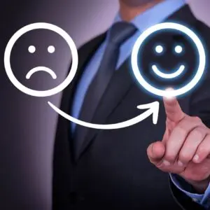 Two Smiley Faces in White on a Glass Screen